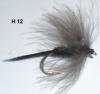 la "truc en plume" noire (mouche sèche)